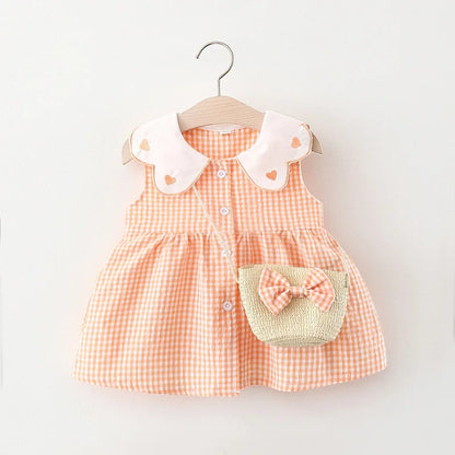 Vestido xadrez infantil acompanha bolsa