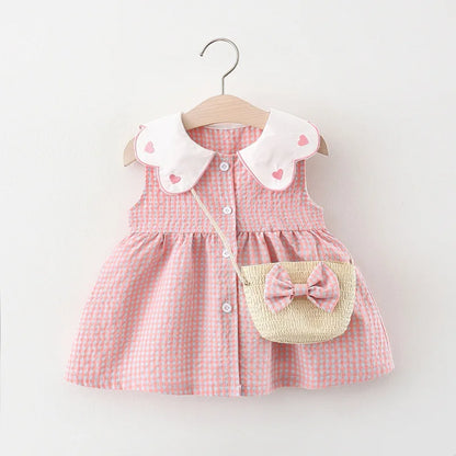 Vestido xadrez infantil acompanha bolsa