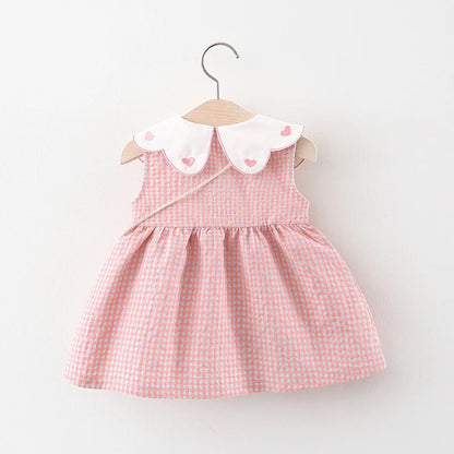 Vestido xadrez infantil acompanha bolsa