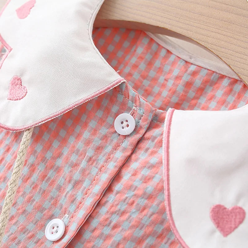 Vestido xadrez infantil acompanha bolsa