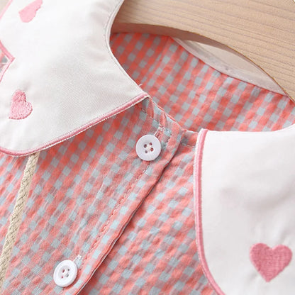 Vestido xadrez infantil acompanha bolsa